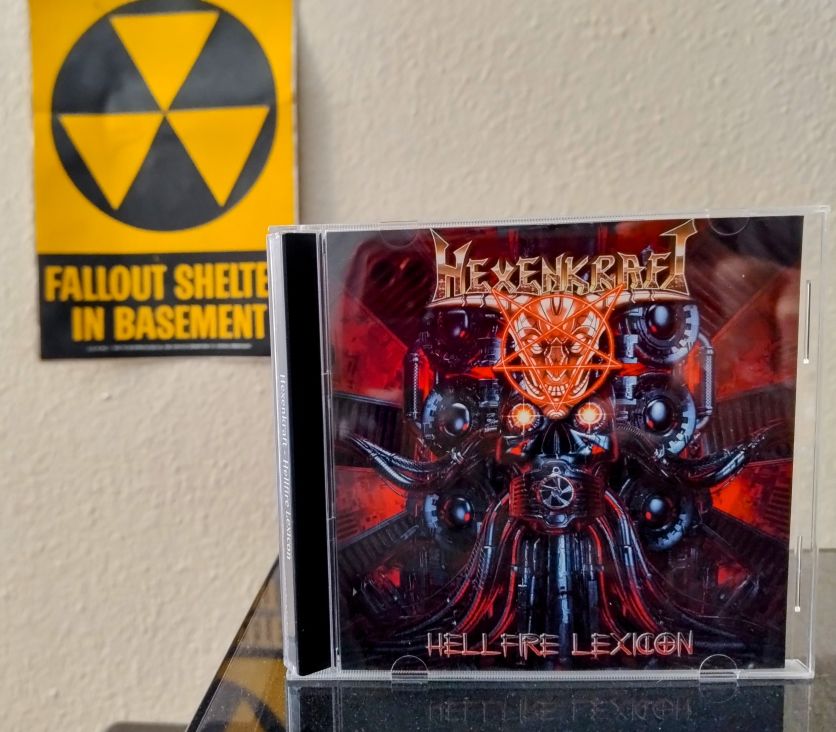 Cover of Hexenkraft's Hellfire Legion album, with a sort of firey skull motif